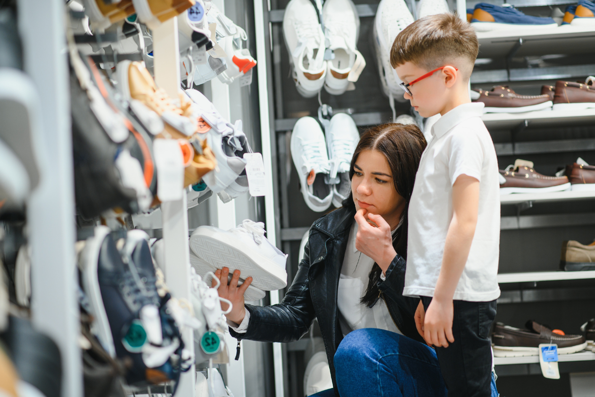 A mother and son back to school shopping for new shoes in Texas.